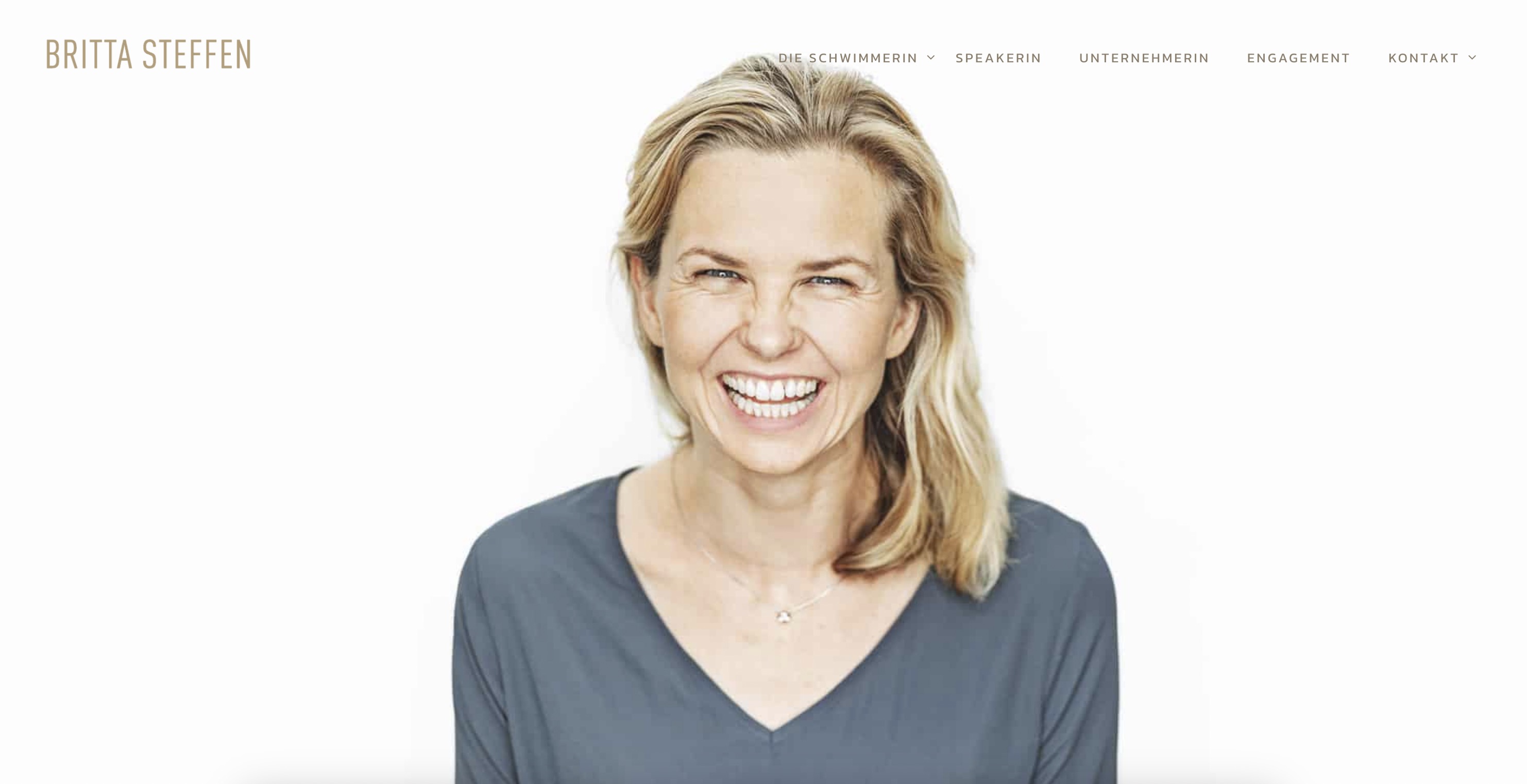 A screenshot of the website design, showing Britta Steffen swimming in vibrant color underwater